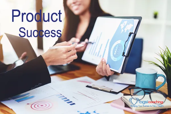 woman showing chart | product marketing | product success | BGSICoaching | MOJO The Meaning of Life and Business Podcast