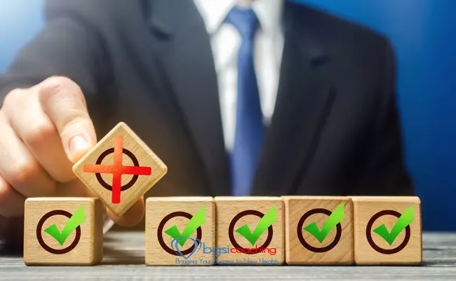 Man breaks a row of check boxes ticks with a red X. Creation of artificial bureaucratic obstacles, corruption. Sabotage. BGSICoaching | MOJO Podcast